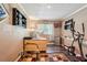 Office area featuring hardwood floors, neutral paint, and a ceiling fan at 1522 Sprayberry Dr, Marietta, GA 30066