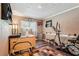 Office area with hardwood floors, natural light, ceiling fan, and neutral paint at 1522 Sprayberry Dr, Marietta, GA 30066