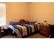 Bedroom with a bed, desk, and window with blinds at 20 Autumn Canyon Se Path, Cartersville, GA 30121