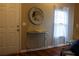 Entryway showcasing a decorative mirror, console table, and hardwood flooring at 20 Autumn Canyon Se Path, Cartersville, GA 30121