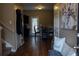 Inviting entryway with hardwood floors, a dining table, and stylish decor, creating a warm welcome at 20 Autumn Canyon Se Path, Cartersville, GA 30121