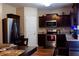 Spacious kitchen with stainless steel appliances, granite countertops, and wood cabinets at 20 Autumn Canyon Se Path, Cartersville, GA 30121