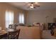 Open-concept living room with a ceiling fan and a comfortable seating area at 20 Autumn Canyon Se Path, Cartersville, GA 30121