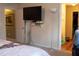 Another view of main bedroom showing a tv, doorway and furnishings at 20 Autumn Canyon Se Path, Cartersville, GA 30121