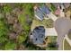 Overhead view showcasing the house and landscaped lawns in a well-maintained neighborhood at 439 Lake Point Trce, Canton, GA 30114