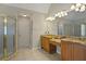 Spacious bathroom featuring double sink vanity and glass enclosed shower at 439 Lake Point Trce, Canton, GA 30114