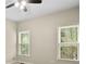 Bedroom with two windows, neutral walls, and carpet at 439 Lake Point Trce, Canton, GA 30114