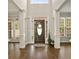 Grand foyer with hardwood floors and soaring ceilings, open and airy at 439 Lake Point Trce, Canton, GA 30114