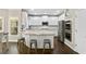 Modern kitchen with stainless steel appliances, island, and granite countertops at 439 Lake Point Trce, Canton, GA 30114