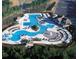 Aerial view of a resort style community pool, showcasing the many lounge chairs at 439 Lake Point Trce, Canton, GA 30114