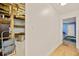 Unfinished basement with open ceiling, exposed wood frame, cement walls, and visible storage space at 4420 Thorngate Ln, Acworth, GA 30101