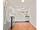 Functional kitchen with stainless steel appliances and hardwood floors, perfect for cooking at 4420 Thorngate Ln, Acworth, GA 30101