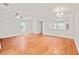 Expansive living space with hardwood floors, ceiling fan and an open layout at 4420 Thorngate Ln, Acworth, GA 30101