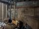 Unfinished basement featuring concrete walls and floor with some storage boxes at 1895 Thomasville Se Dr, Atlanta, GA 30315
