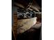 A view into an unfinished basement showcasing wooden supports and exposed dirt at 1895 Thomasville Se Dr, Atlanta, GA 30315