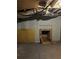 Unfinished basement with exposed ductwork and a small, brick fireplace at 1895 Thomasville Se Dr, Atlanta, GA 30315