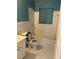 Bathroom with a toilet, tub, and a white vanity at 1895 Thomasville Se Dr, Atlanta, GA 30315