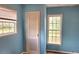 View of the bedroom, highlighting the window and closet at 1895 Thomasville Se Dr, Atlanta, GA 30315