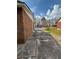 Long driveway leads up to this brick house and fenced in yard at 1895 Thomasville Se Dr, Atlanta, GA 30315