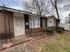 Exterior shot of a brick home showcasing the front door and security features at 1895 Thomasville Se Dr, Atlanta, GA 30315