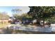Charming home featuring a neat lawn, a white picket fence, and mature trees, offering an inviting street view at 1895 Thomasville Se Dr, Atlanta, GA 30315