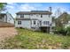 A spacious backyard, featuring a deck and ample green space at 2077 Alcovy Trace Way, Lawrenceville, GA 30045