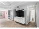 Open bedroom featuring modern furniture and a doorway leading to a bathroom at 2077 Alcovy Trace Way, Lawrenceville, GA 30045