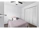 A simply furnished bedroom with closet space, featuring a cozy bed and neutral decor for a serene atmosphere at 2077 Alcovy Trace Way, Lawrenceville, GA 30045