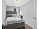Bedroom featuring gray walls, hardwood floors and natural light at 2077 Alcovy Trace Way, Lawrenceville, GA 30045