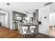 Stylish kitchen with granite countertops, stainless steel appliances, and breakfast bar at 2077 Alcovy Trace Way, Lawrenceville, GA 30045