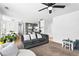 Open concept living room and kitchen with hardwood floors and modern decor at 2077 Alcovy Trace Way, Lawrenceville, GA 30045