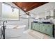 Bathroom with a modern tub, glass shower, double sink vanity and unique lighting at 4009 Glenlake Nw Trce, Kennesaw, GA 30144