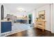 Modern kitchen with blue and white cabinetry, patterned tile floors, and stainless steel appliances at 4009 Glenlake Nw Trce, Kennesaw, GA 30144