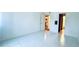 Bright room showcasing tiled floors and doorways leading to other areas of the home at 1382 Branch Dr, Tucker, GA 30084