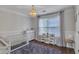 Adorable Bedroom with a crib, dresser, shelving and a cozy rug at 3405 River Ridge, Stockbridge, GA 30281