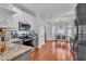 Open kitchen featuring white cabinets, granite countertops, and stainless steel appliances at 3405 River Ridge, Stockbridge, GA 30281