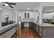 Spacious living room with gray kitchen island, open floor plan at 3405 River Ridge, Stockbridge, GA 30281