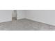Bright, carpeted bedroom with walk-in closet showing neutral walls and flooring at 1150 Collier Nw Rd # F11, Atlanta, GA 30318