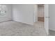 Bright bedroom with a large window, neutral carpet and white walls at 1150 Collier Nw Rd # F11, Atlanta, GA 30318