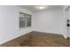 Well-lit living area showcasing hardwood floors and a window providing natural light at 1150 Collier Nw Rd # F11, Atlanta, GA 30318