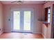 Dining Room showcasing double doors leading to a yard space at 4443 Whitt Mill Nw Rd, Acworth, GA 30101