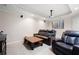 Basement theater features comfortable seating, projector, tray ceiling and recessed lighting at 111 Glen Trl, Woodstock, GA 30188