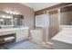 Large bathroom with separate tub, shower, and double vanity sinks at 111 Glen Trl, Woodstock, GA 30188