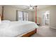 Bedroom featuring natural light and an adjoining bathroom at 111 Glen Trl, Woodstock, GA 30188