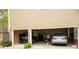 Spacious three-car garage featuring ample storage space for vehicles, tools and home maintenance equipment at 111 Glen Trl, Woodstock, GA 30188