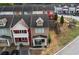 Aerial view of a townhouse complex with manicured lawns and convenient parking at 1736 Brookside Lay Cir, Norcross, GA 30093