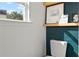 Bright bathroom features toilet and wall decor at 1736 Brookside Lay Cir, Norcross, GA 30093