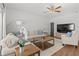 Bright and inviting living room with a comfortable sofa and stylish decor at 1736 Brookside Lay Cir, Norcross, GA 30093