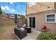 Back patio with outdoor furniture, string lights, a grill and a sliding door to the house at 1736 Brookside Lay Cir, Norcross, GA 30093