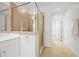 Spacious bathroom featuring a glass shower, tile floors, and a walk-in closet at 2251 W Village Se Ln, Smyrna, GA 30080